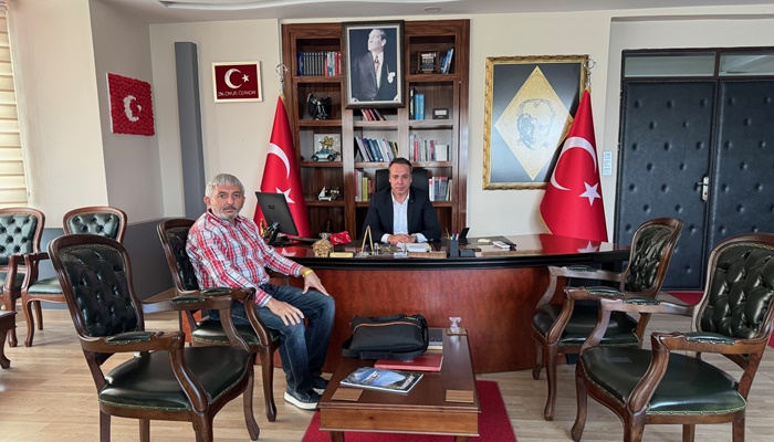 Gazeteci Yürekli, Erzin Kaymakamı Özaydın’ı ziyaret etti