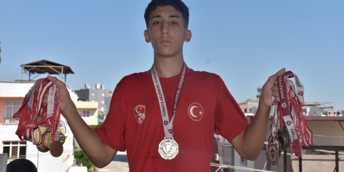 Evinin damında başladığı güreşte milli formayı terletecek