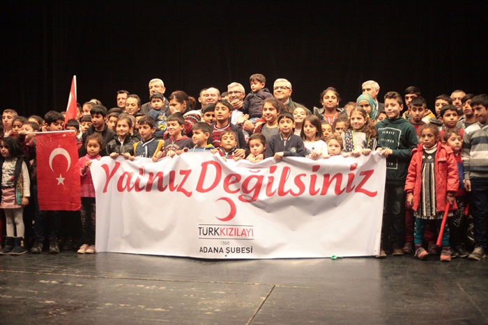 Bin yetime giyecek yardımı 