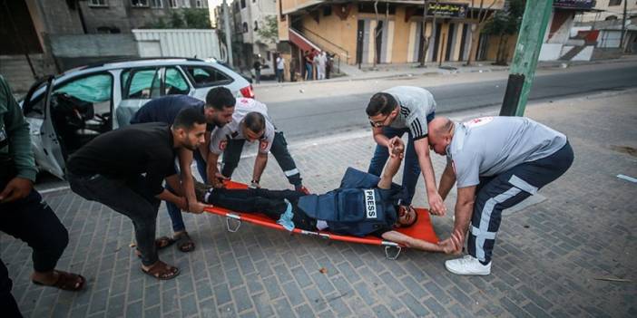 İsrail'in Gazze saldırısında AA kameramanı Muhammed el-Alul ile foto muhabiri Mustafa Hassuna yaralandı